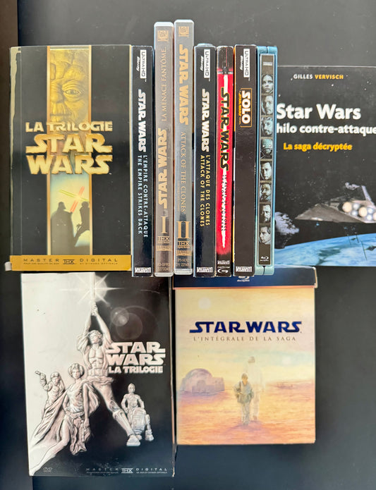 Méga Pack Star Wars — Trilogie IV–V–VI en VHS + DVD + Blu-ray + Livre + Épisodes I & II (DVD) + II Attack of the Clones (UHD 4K) + The Force Awakens (Blu-ray) + Solo + Rogue One (Blu-ray)