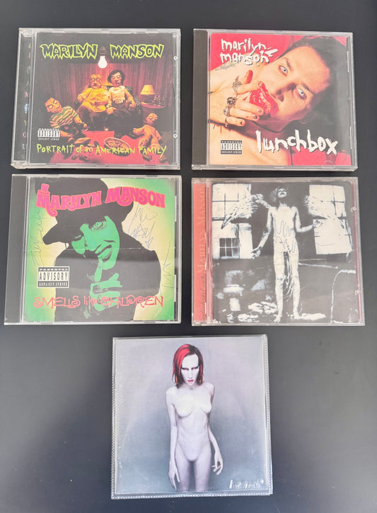 Pack Marilyn Manson (5 CD) — Portrait of an American Family + Lunchbox + Smells Like Children (signé 1996) + Antichrist Superstar (signé 1996) + Mechanical Animals — éditions d’époque